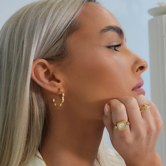 Hoop Earrings Wavy Texture Hoop Earrings 18K Gold-Plated in 18K gold-plated – Meiva earrings view 2