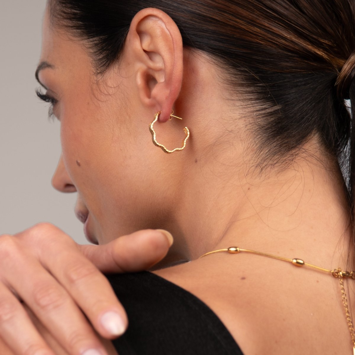 Hoop Earrings Wavy Texture Hoop Earrings 18K Gold-Plated in 18K gold-plated – Meiva earrings view 6
